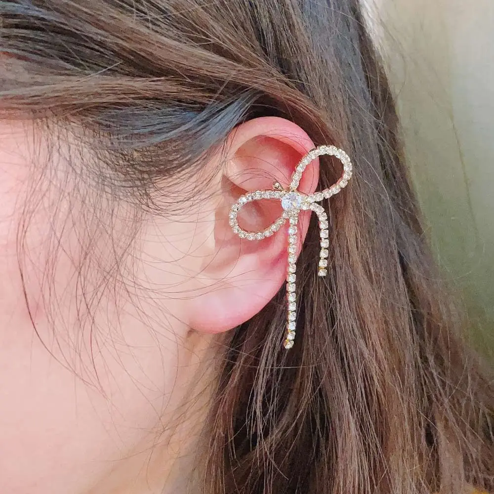 

Design Sense Rhinestone Bow-knot Shape Ear bone Clip for Female Women of Korean Simple Temperament Clip Earrings Ear Cuffs