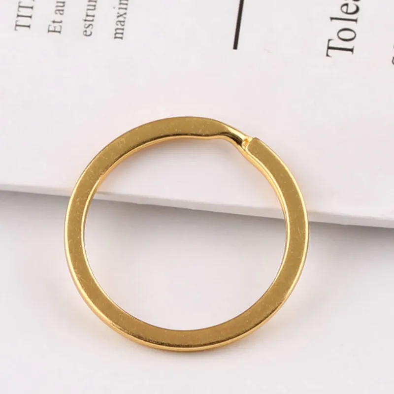 

A pack of 100 DIY jewelry accessories metal keychain with chain keychain 28/25/30mm golden flat ring jewelry accessories