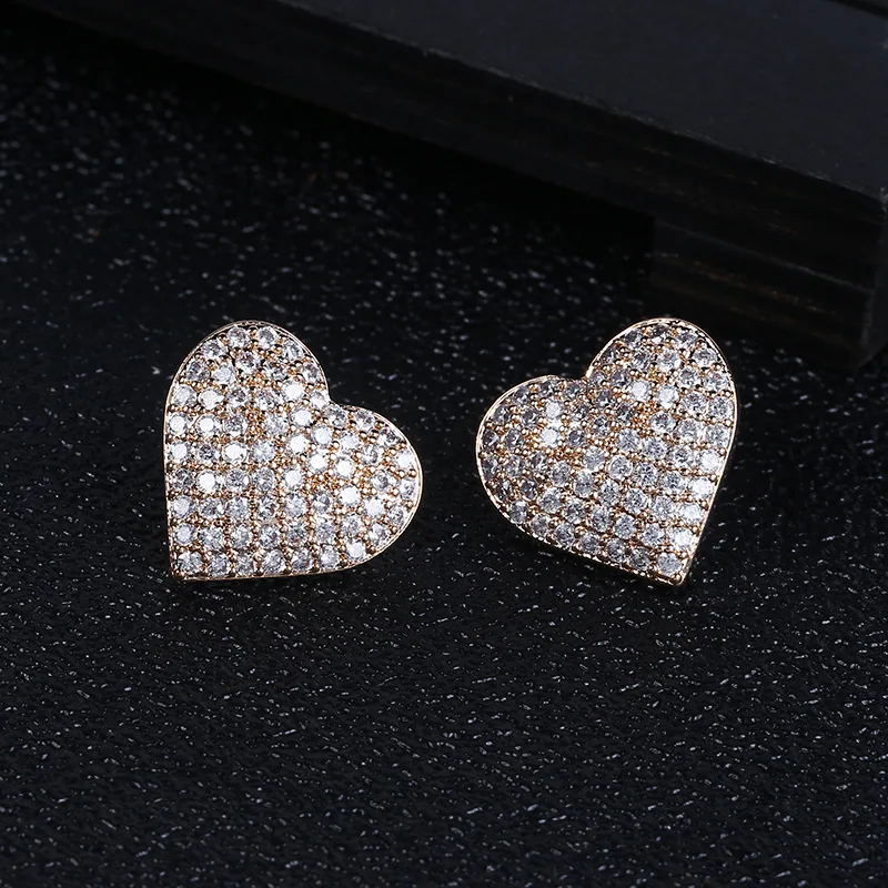 

S925 silver needle Europe and the United States love exaggerated copper micro-encrusted zircon peach heart temperament fashion