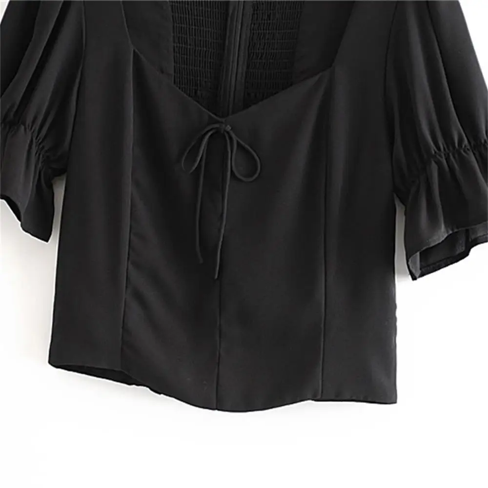 

2020 spring women's new bow square collar bubble short sleeve sexy open-neck shirt French niche retro girl was thin shirt