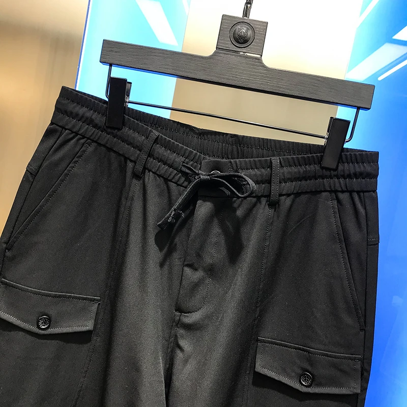 

Men's new suit casual pants in autumn 2020 youth solid black pocket elastic and handsome Leggings men's trousers fashion brand