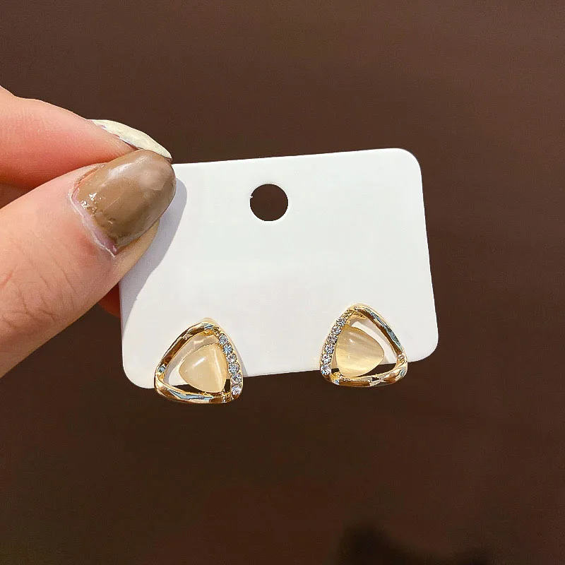 

Delicate triangle opal earrings female Korean simple temperament commuter earrings