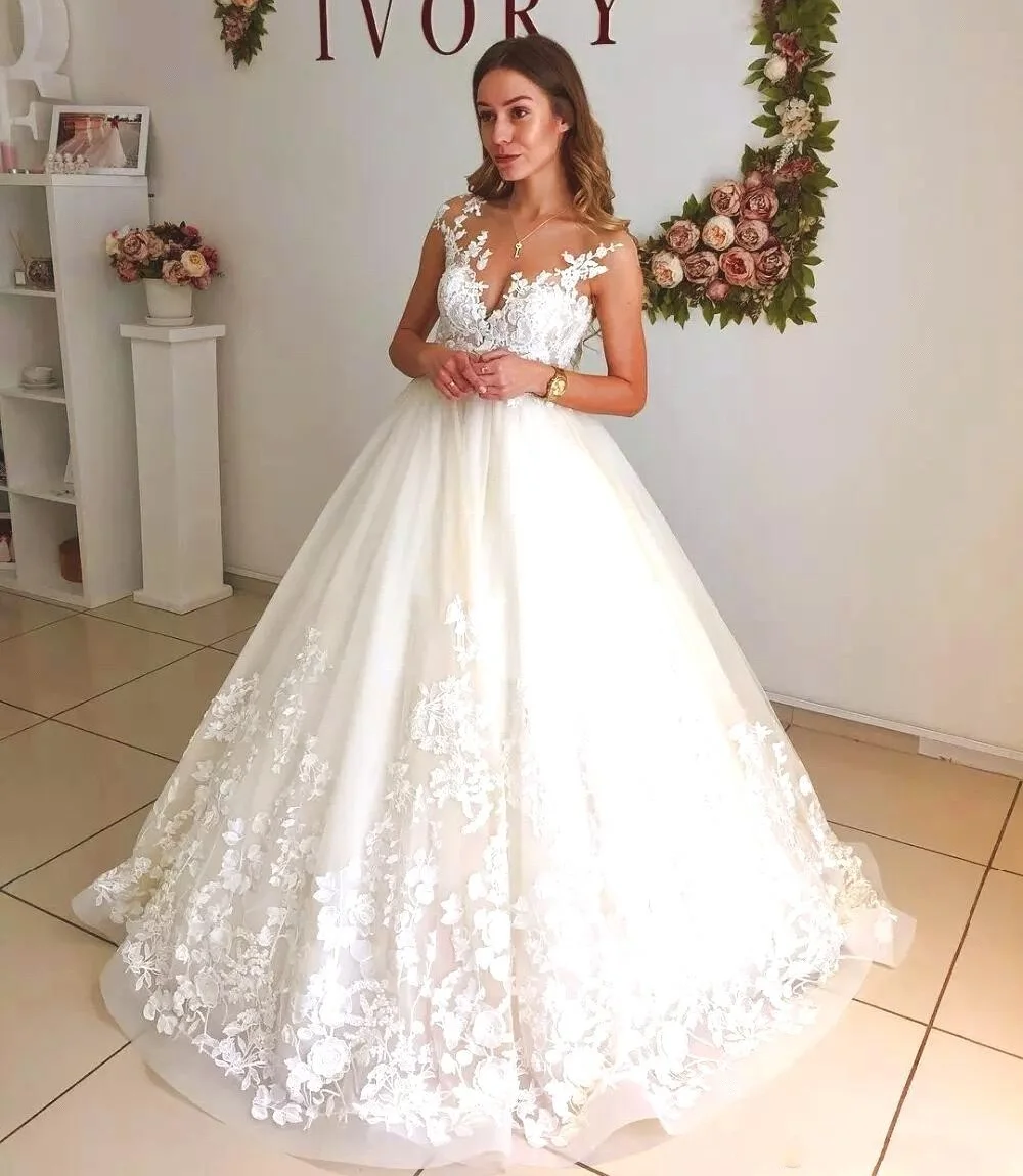 

Элегантные Свадебные платья с открытой спиной Кружева Аппликация Прозрачный вырез платье трапециевидной формы Кепки одежда с длинным рука...