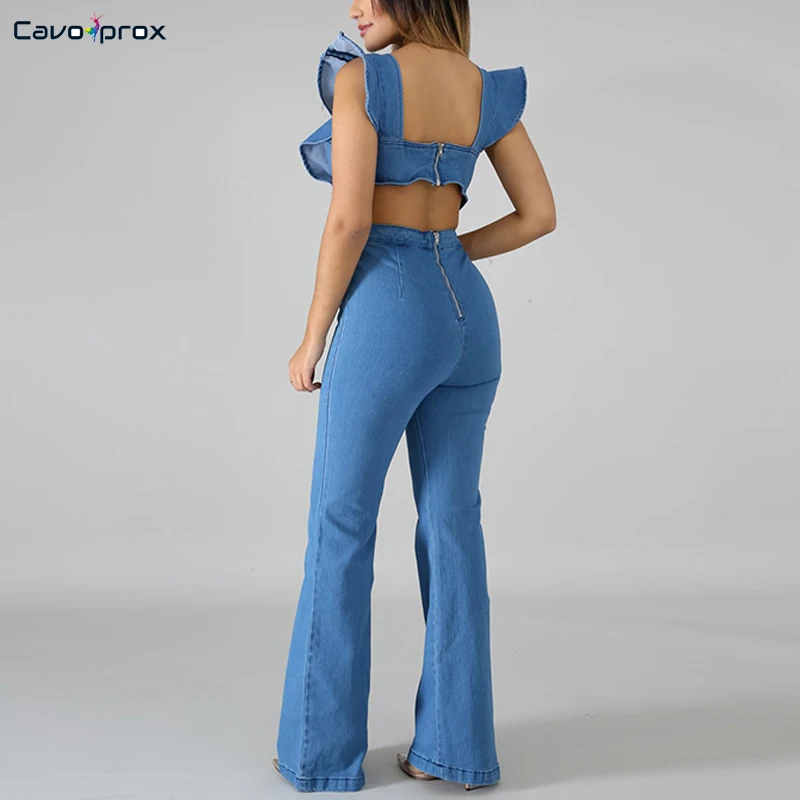 Женский джинсовый комбинезон колокольчик с бабочкой и широкими штанинами