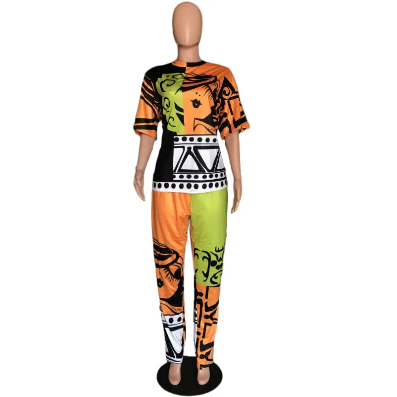 

UETEEY Asymmetrical Top Women Set Plus Size XL-5XL Graffti Print Two Piece Set For Women O-Neck T-Shirt Top And Pant Set