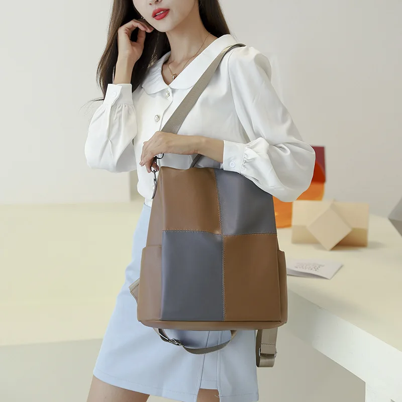 

New backpack street trend bag fashion simple women's bag against color single shoulder hand carry women's bag