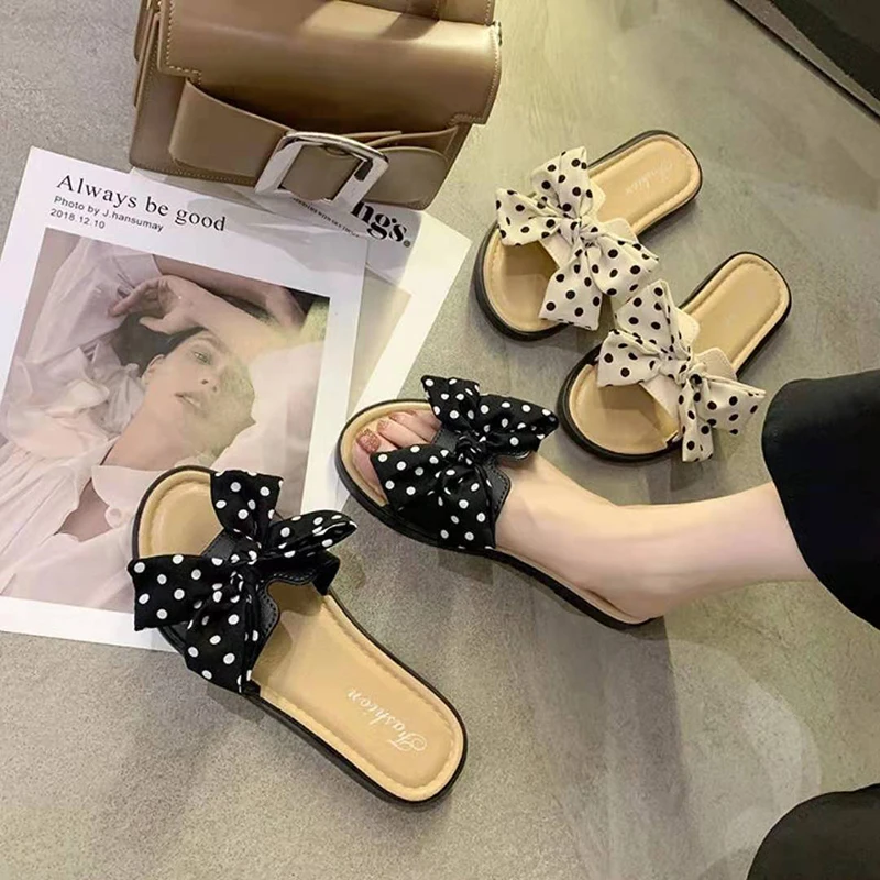 

New bow slippers women Korean women's shoes flower beach shoes sandals women net celebrity ins flat shoes ladies slippers 2021