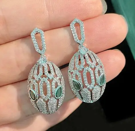 

S925 Sterling Silver needle Animal micro inlaid zircon green eyed snake head Crystal Earrings Jeweller DIY accessories