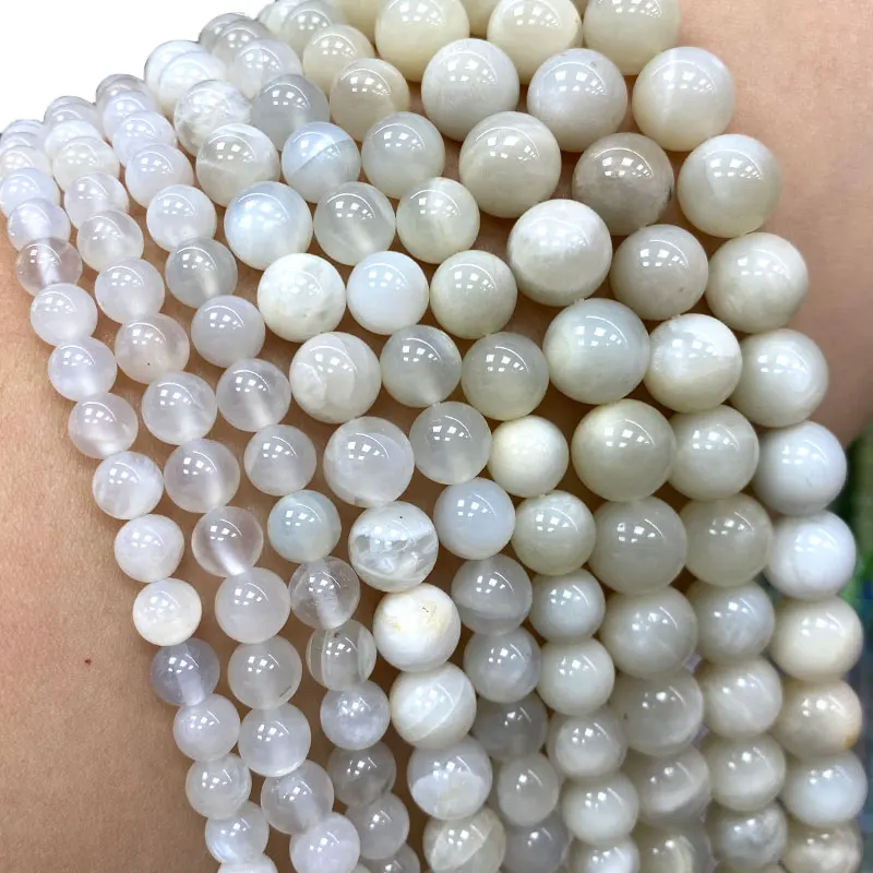 Камень аа. Камень аа. Лунный камень бусины. Белый лунный камень. Гранат топазолит.