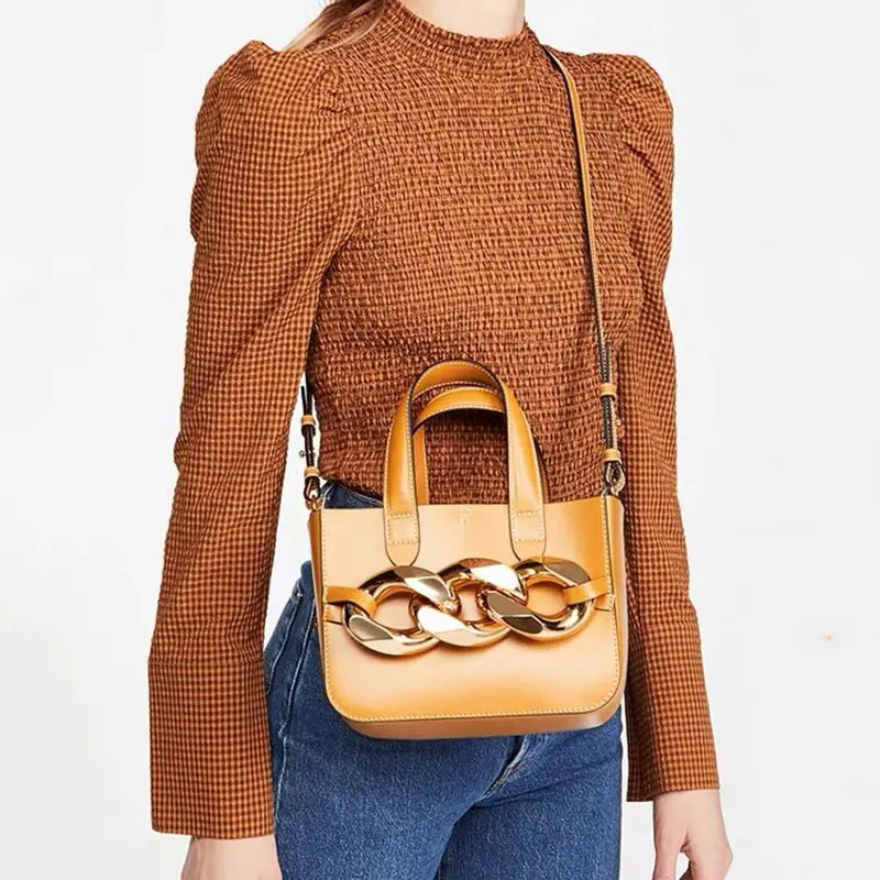 

2021 spring and summer fashion design trend with chain shoulder bag, leather bag and vegetable basket bag