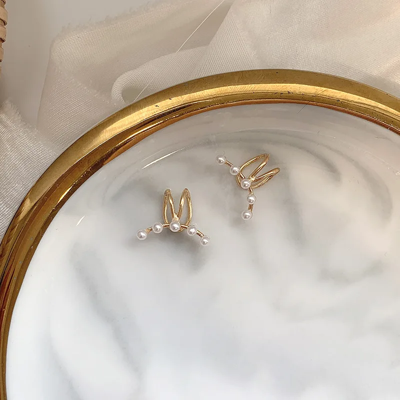 

12 шт./лот новые жемчужные клипсы для ушей женские изогнутые одиночные безболезненные клипсы для ушей Корейская версия простые серьги без пи...