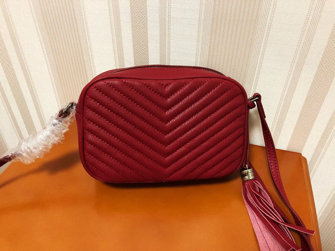 

Female bag 2021 new fashion European and American solid color stripe camera bag shoulder bag messenger bag chain small square ba