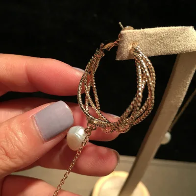 

Fringed circle earrings online celebrity geometric circle Pearl earrings temperament pendant online celebrity silver earrings