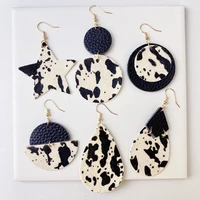 wangaiyao new cow pattern leather earrings first layer cowhide round water drop cow head retro horsehair quality texture fashion