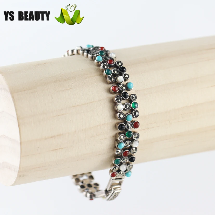 Браслет из серебра 925 пробы с инкрустированными цветными драгоценными камнями