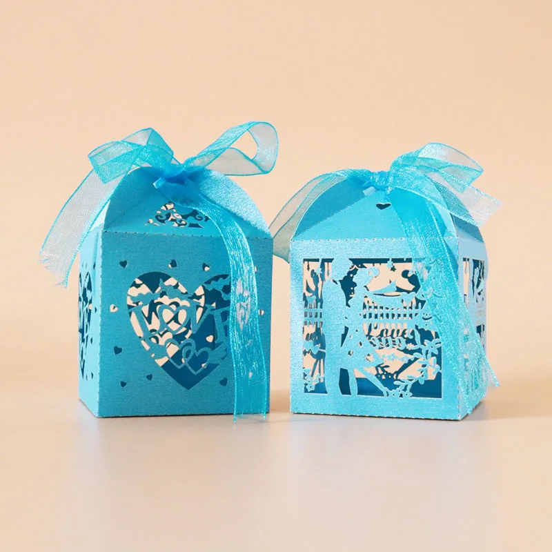 

Laser Cut sweetheart Hollow Wedding Favors Gifts Candy Boxes With Ribbon Pearl Paper Mini Wedding Party Supplies