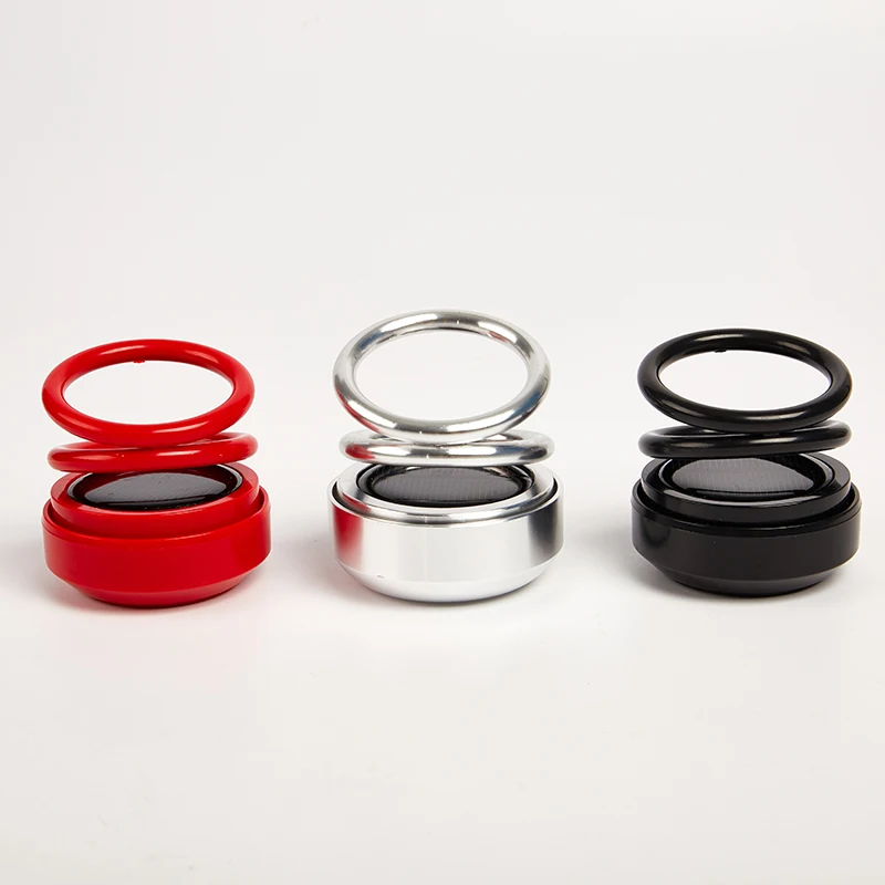 

Car Air Freshener Solar Auto Rotation Ring Suspension Essential Oil Diffuser