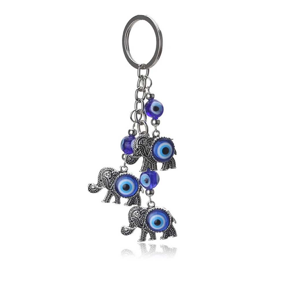 

1PC Blue Evil Eye Charms Keychain Three Elephants Shape Pendent Key Chain Alloy Tassel Car Key Chain Fashion Jewelry Gifts