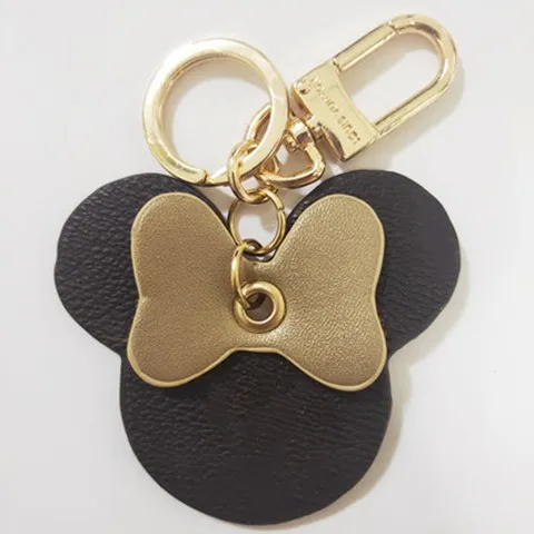 

2020 Hot Luxury Brown Leather Old Flower Mickey Keychain Key Chain For Woman Purse Bag Pendant Car Key Ring Accessories Pendant
