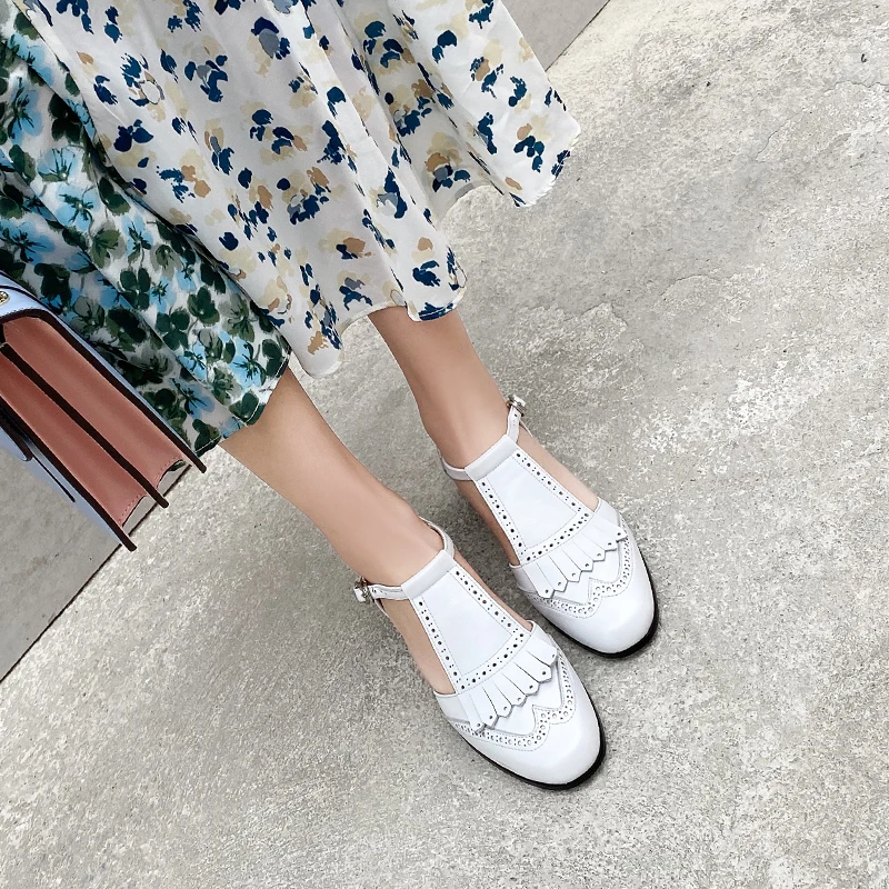 Женские сандалии из натуральной кожи на плоской подошве с бахромой броги розовые