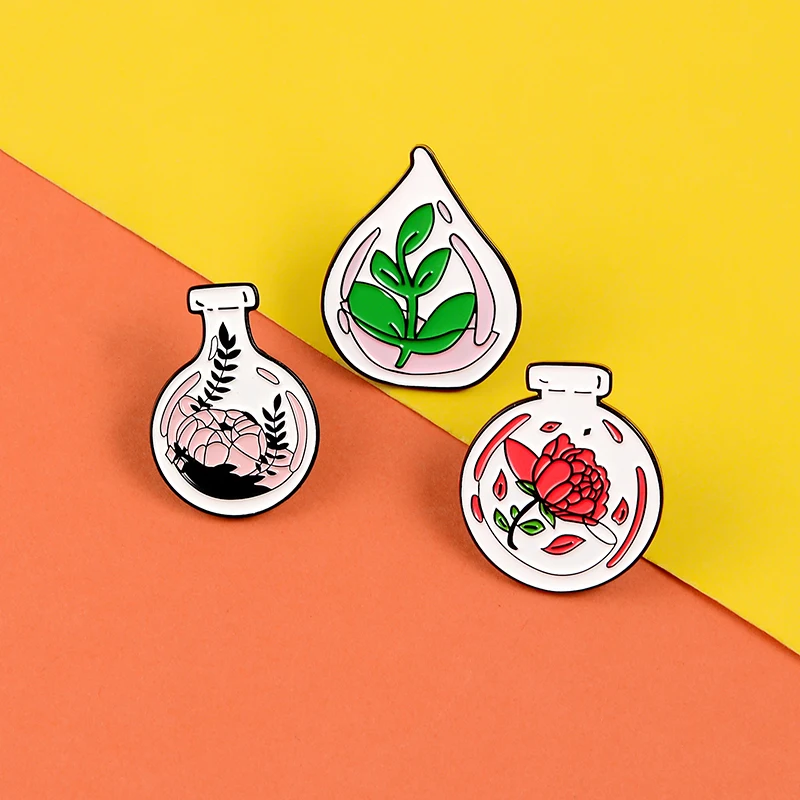 Эмалированные булавки в форме бутылки с растениями красные и розовые значки