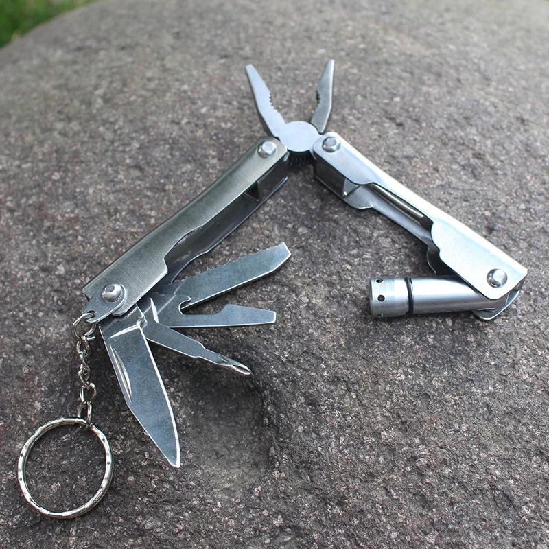 

Outdoor Camping Survival Tools Multitool Tactical Pliers Versatile Repair Folding with LED Military Stainless Steel EDC Gear