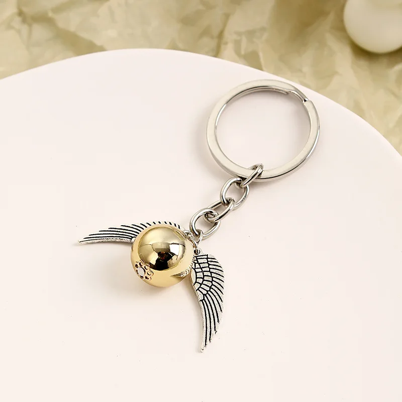 

Movie Jewelry Vintage Style Toy Classic Round Angel Wing Golden Snitch Deathly Hallows Charm Keychain For Men Women Keyring Gift