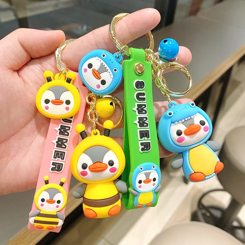 

2021 Fashion Cartoon English Rope Penguin Silicone Keychain Automobile Handbag Pendant Key Chain a Cute Gift For Your Girlfrien