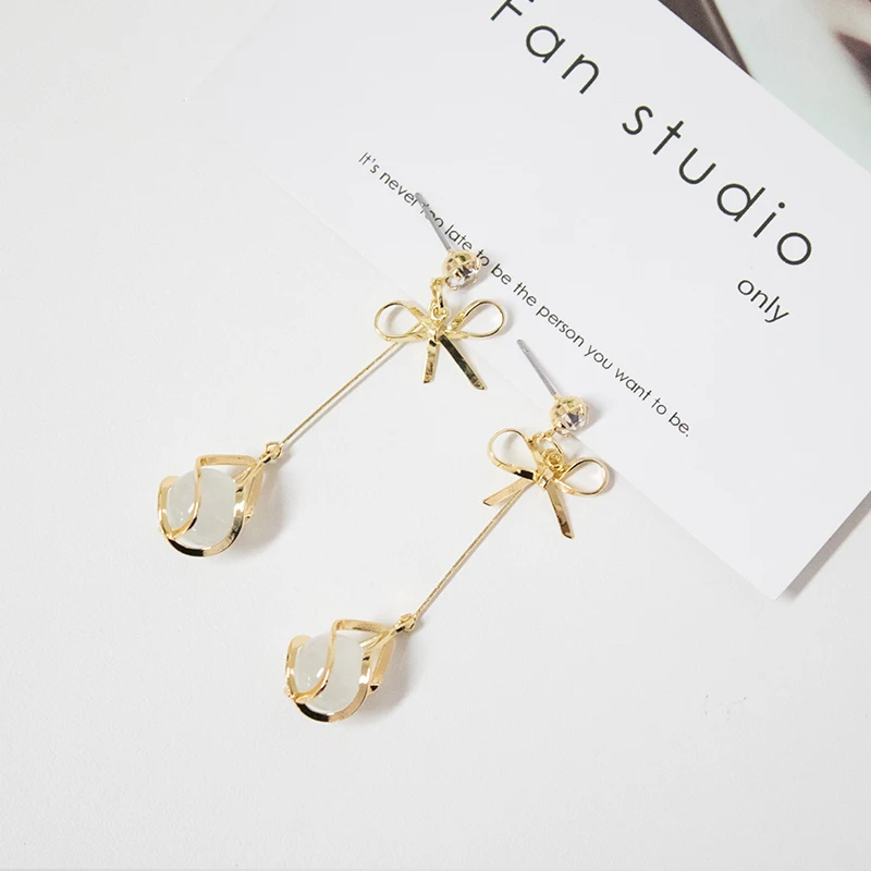 

Earrings New Arrival Fashion Metal Trendy Water Drop Women Dangle Earrings Simple Korean Jewelry Female Long Pendant Eardrop