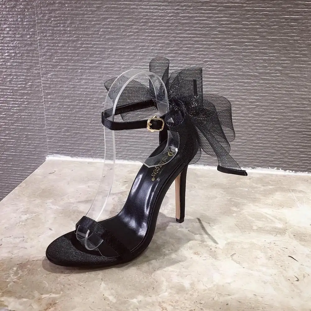 Босоножки женские на высоком каблуке с острым носком пряжкой и большим бантом |