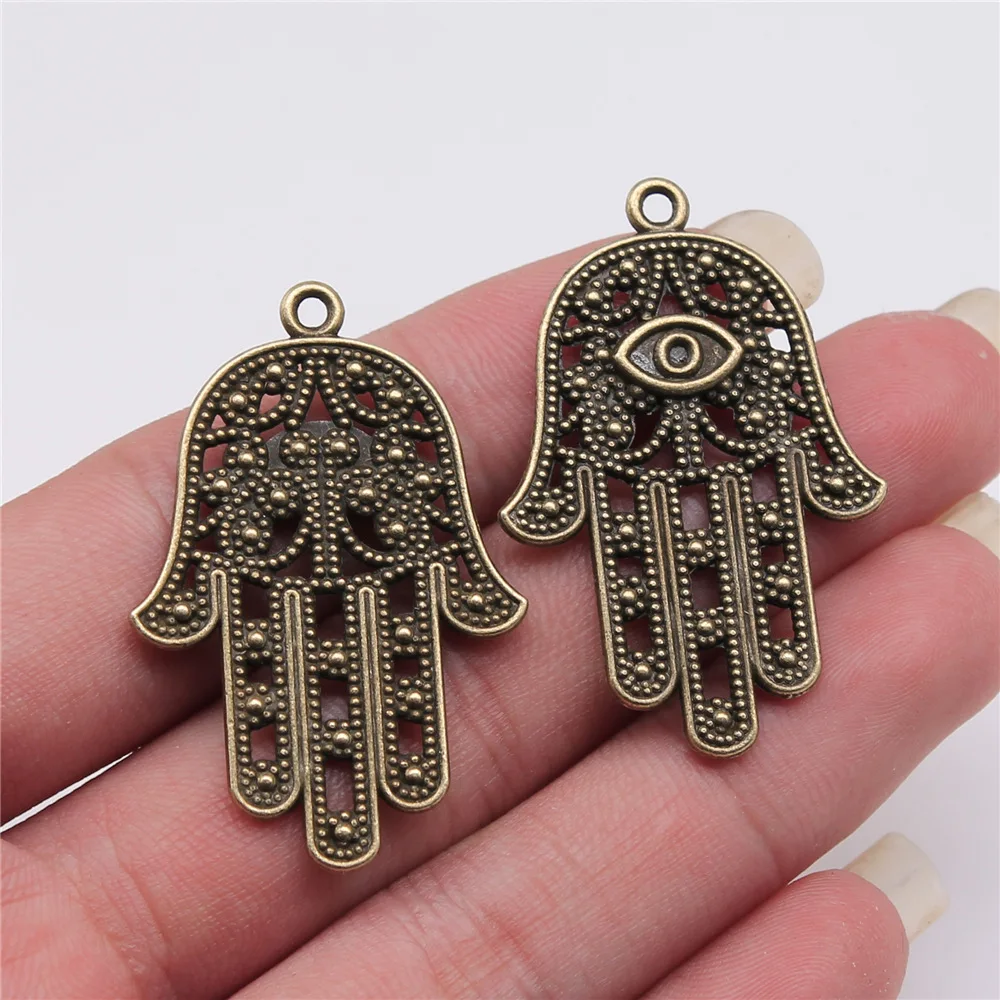

10pcs 42x28mm Antique Bronze Color Hand With Eye Charms For Jewelry Making A12631