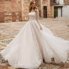 Великолепное свадебное платье 2021, кружевное винтажное платье А-силуэта с круглым вырезом, длинным рукавом, пуговицами и шлейфом из органзы, свадебные платья