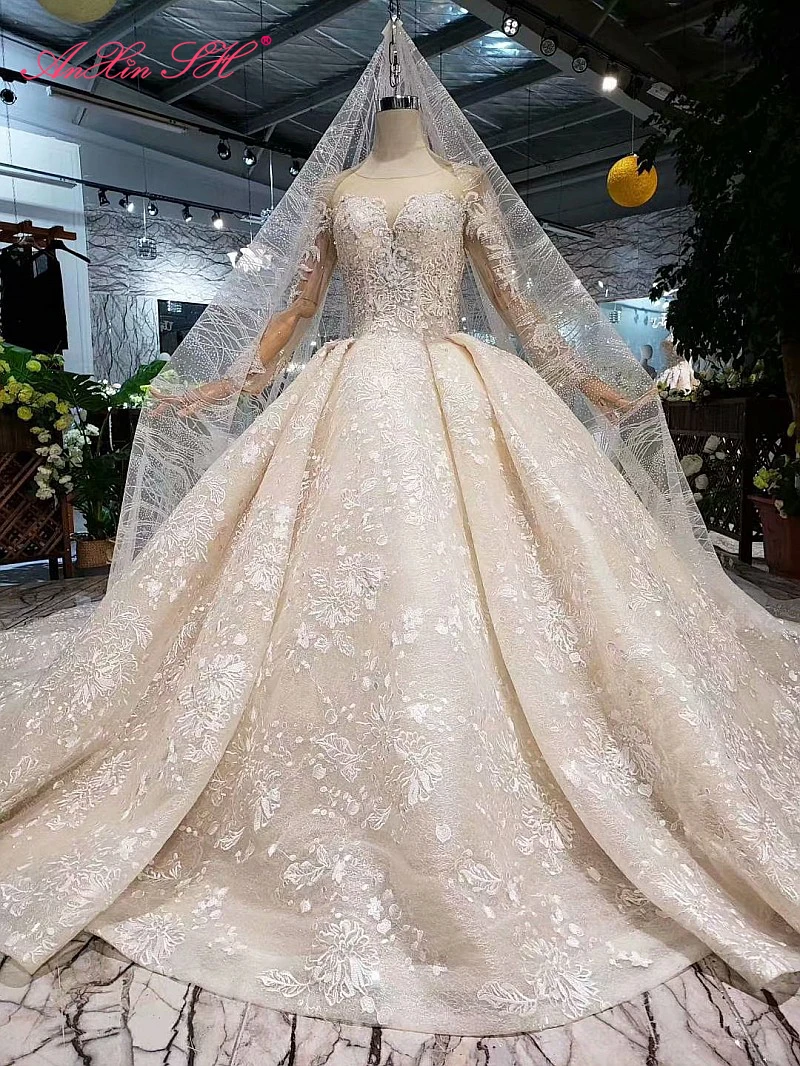 

AnXin SH Luxury princess white lace beading crystal o neck long sleeve lace up illusion long wedding dress 100% real photo