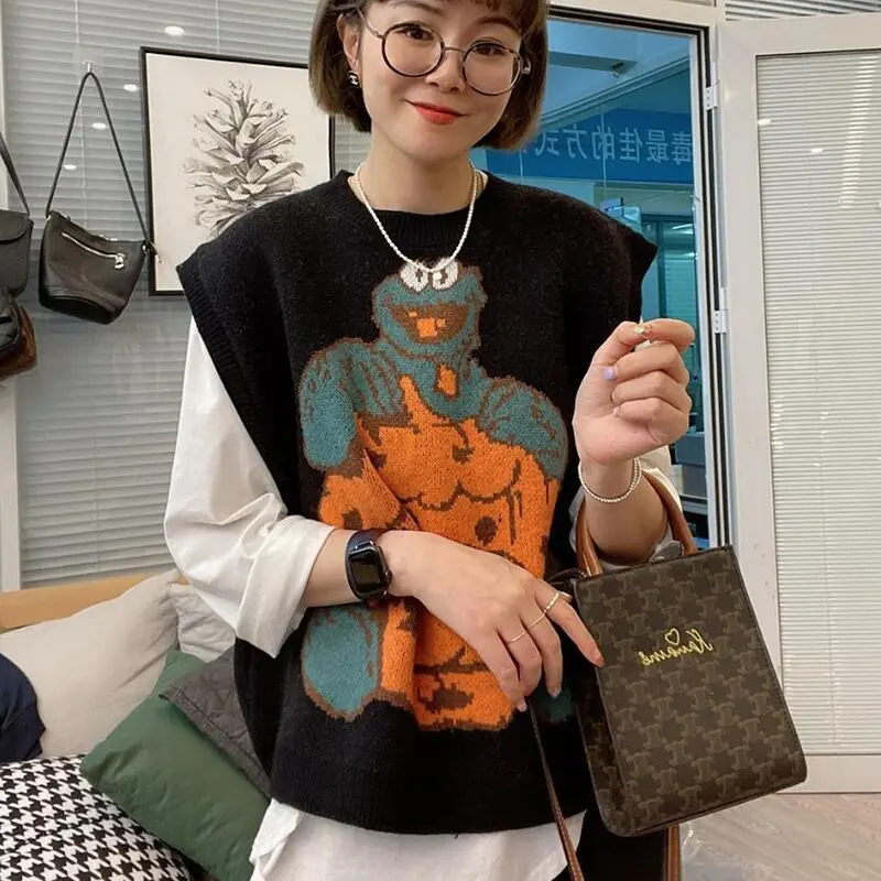 

Женский свитер, жилет с круглым вырезом, универсальный стиль, женский осенне-зимний вязаный корейский Свободный черный пуловер без рукавов ...