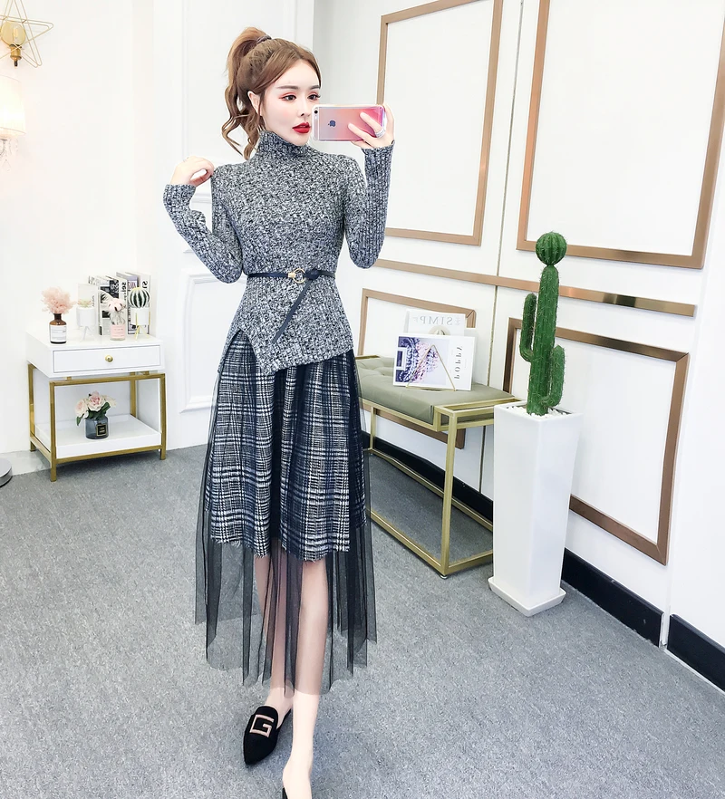

Fashion women's suit 2020 new high collar irregular top + fashionable plaid skirt two-piece suit