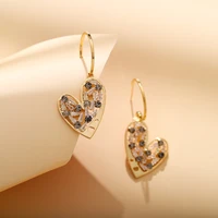 wonderful hollow alloy gold color love heart dangle earrings for women ladies full shiny cz stone pendant earrings jewelry