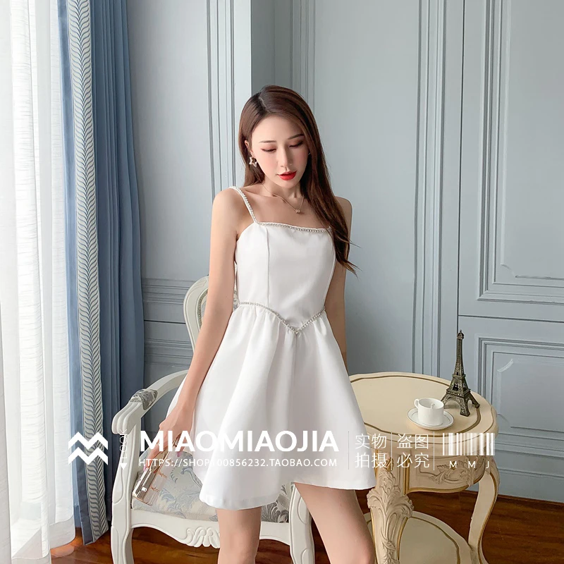 

Simple Elegant White Dress Female 2021 Summer New Slash Collar Off The Shoulder Diamond Backless Mini Suspender Dress for Women