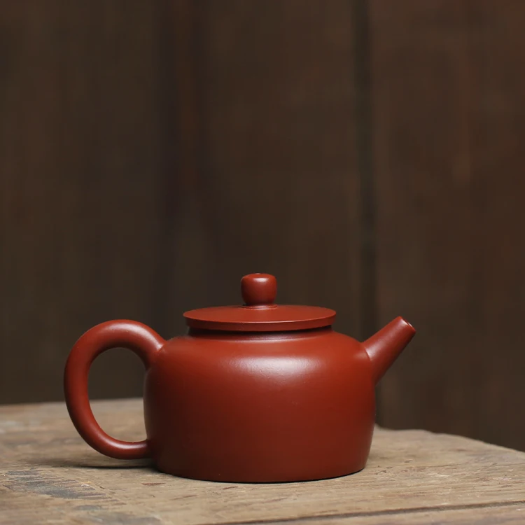 

As in yixing Tan Junde clock zisha teapot zhu mud ball hole filter water good large large capacity great bead