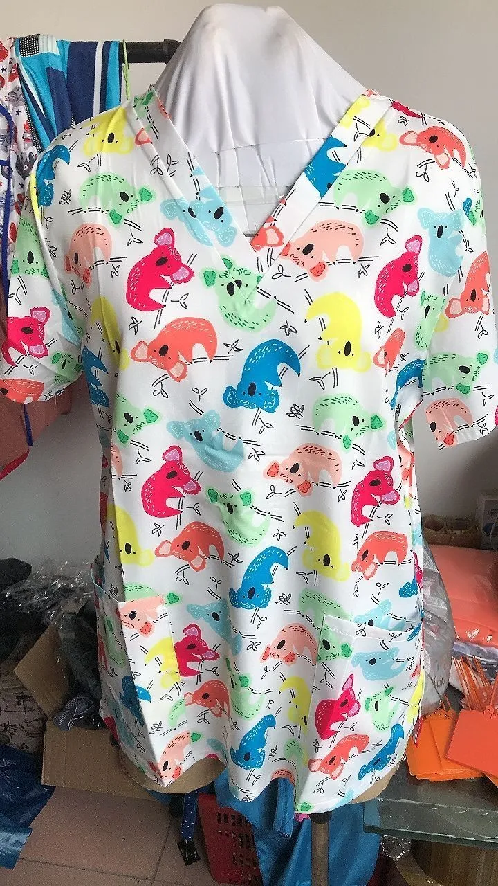 

Nurse Uniform Women Short Sleeve V-neck Cartoon Pattern Tops Nursing Working Uniform T-shirts Tops Nurse Acessorios Femininos
