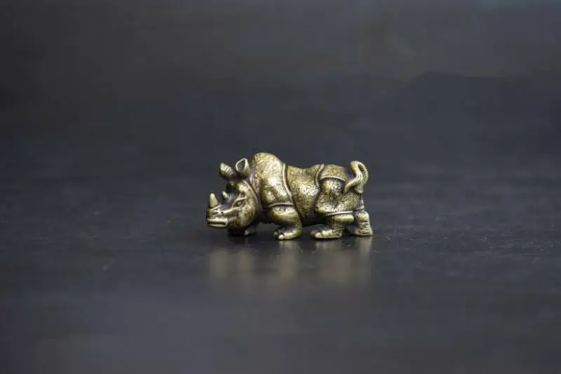 

China's archaize brass rhino Small statue
