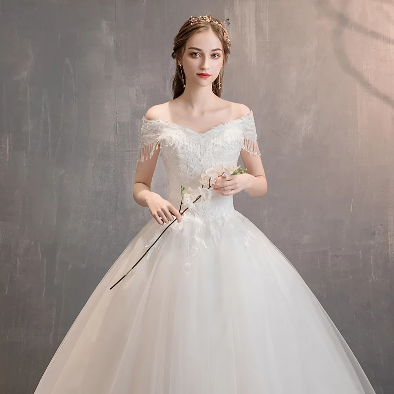 Роскошные кружевные свадебные платья с коротким рукавом и открытыми плечами