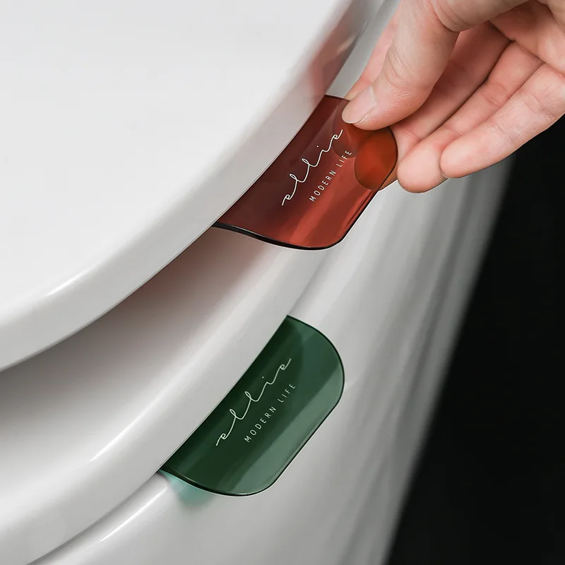 

1 Pcs Creative Toilet Cover Handle and Lid Lifter Household Portable Anti Dirty Hand Toilet Stick Strip Tool Flap Handle Device