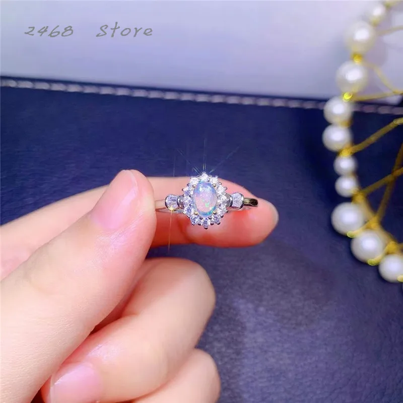 

The new 925 silver inlaid natural opal ring, women's jewelry, simple and generous personality, a gift for girls