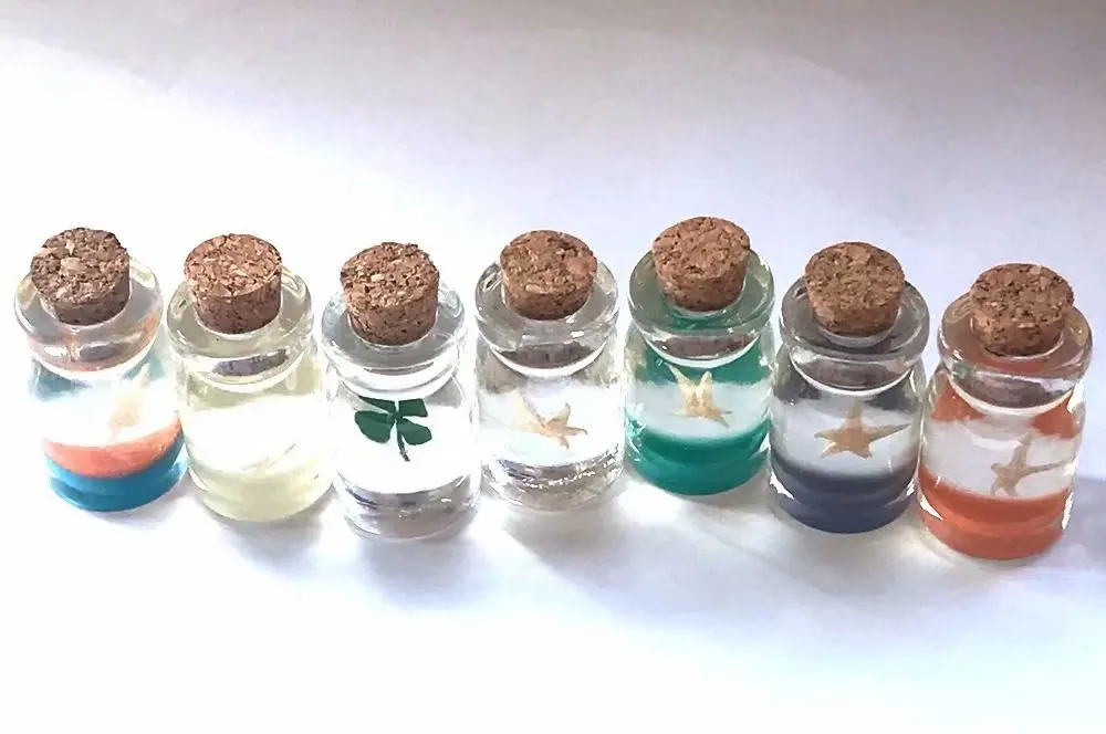 

16 pcs fashion real starfish four leaf clover Drifting bottle jewelry