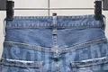 Lato w stylu dsq marka włoska dżinsy męskie wąska krótka dżinsy męskie spodnie jeansowe zipper stripe hole niebieskie szorty dziura dżinsy dla mężczyzn