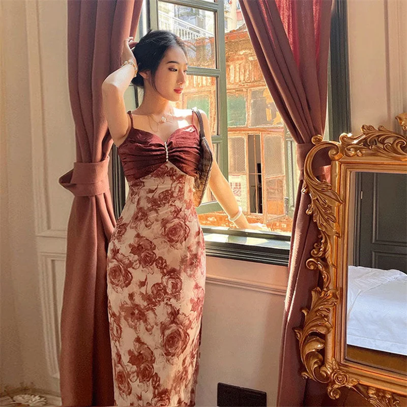 

Retro artistic bag hip floral suspender skirt 2021 summer new dress feminine look thin and long