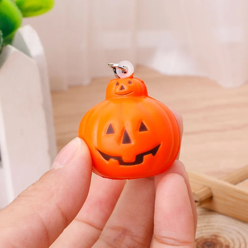 

Mini Squishy Squeeze Halloween Pumpkin Light Bag Phone Pendant Lanyard PU Toy
