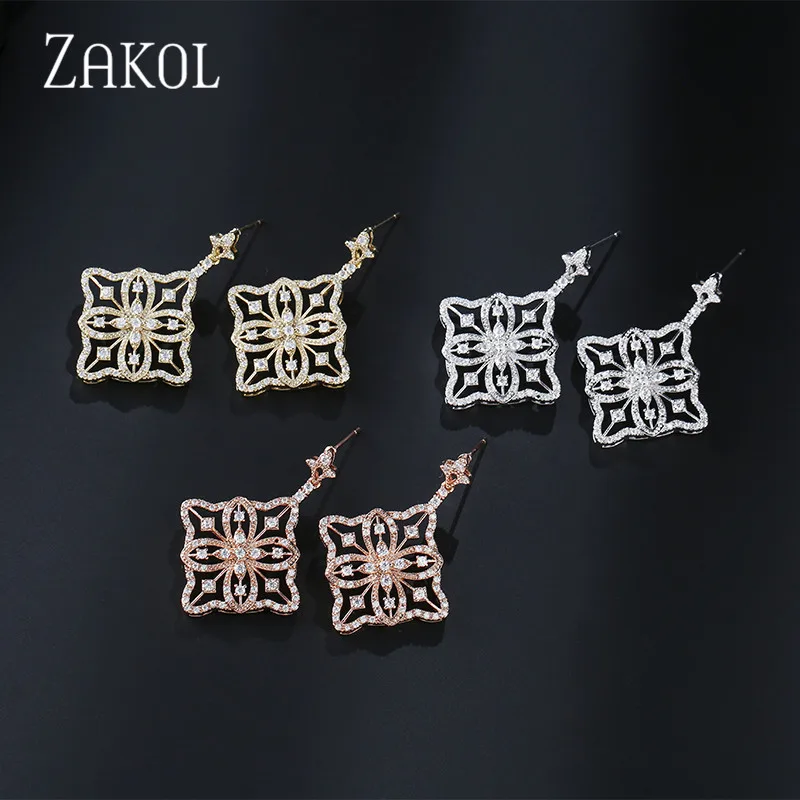 Новинка серьги-подвески ZAKOL с медными цирконами полые цветы игольчатые серьги