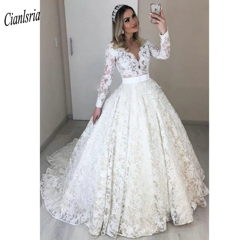 

Elegant Long Sleeve Illusion Ball Gown Wedding Dresses With Sashes Appliques V-Neck See Through Back Long Bridal Wedding Dress