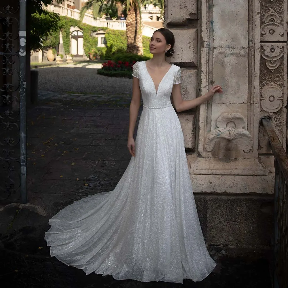 

Свадебное бохо-платье 2021 Новое сексуальное платье с v-образным воротом, с низким вырезом на спине Свадебное платье Роскошная обувь с украшен...